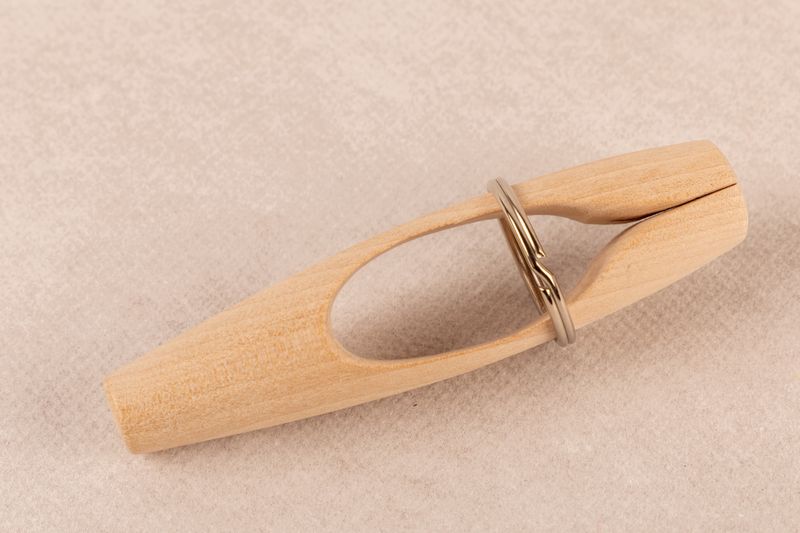 SPOLEHYLSE FOR KNIPLIEPINNER